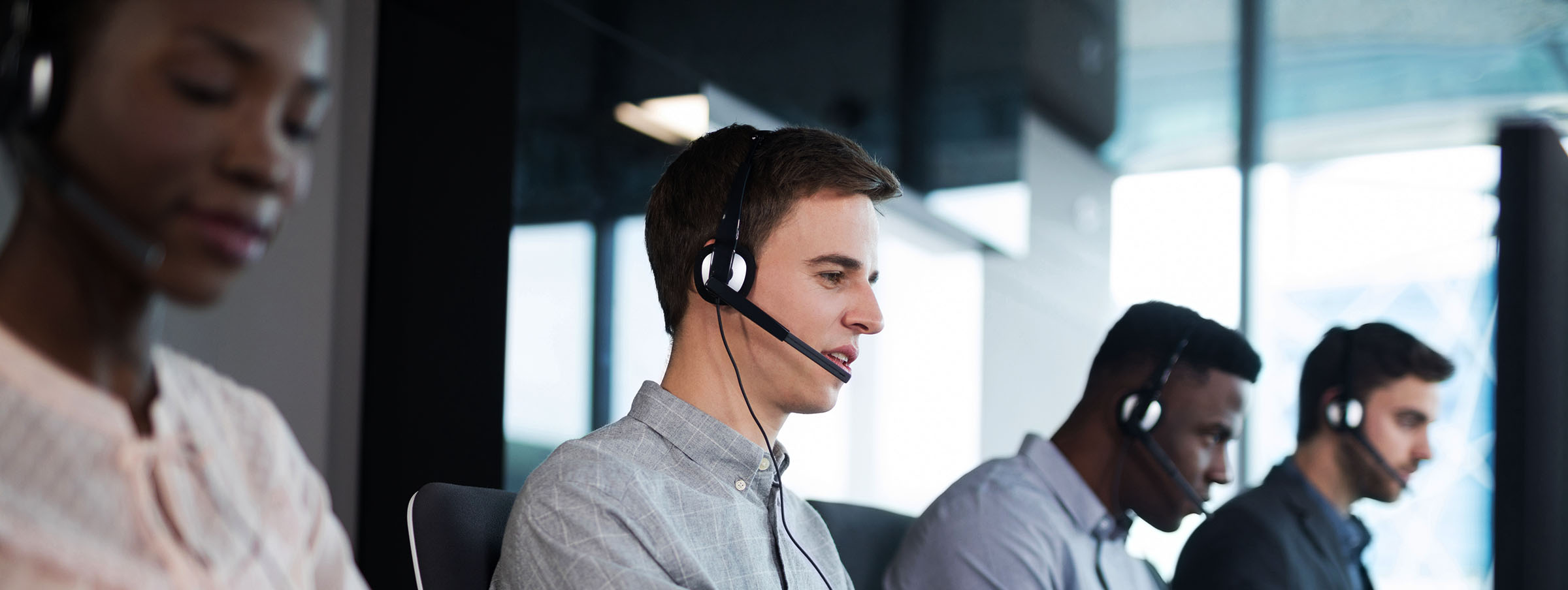 Customer service executives working at office